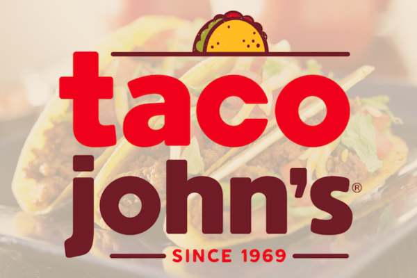 Taco John's Logo with Tacos in the Background