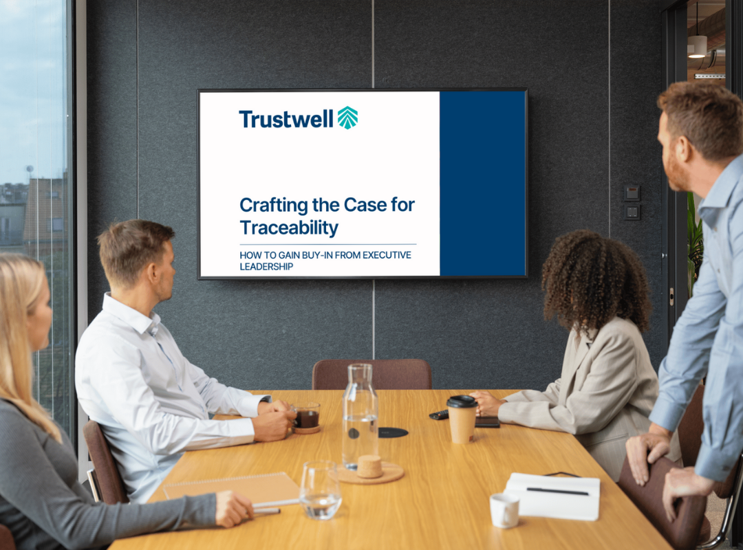 Crafting the Case for Traceability, Meeting with eBook Displayed on the tv screen at the head of the table.